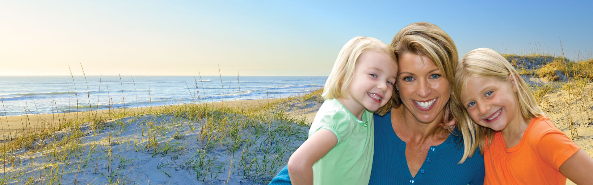 mother and daughter at the coast